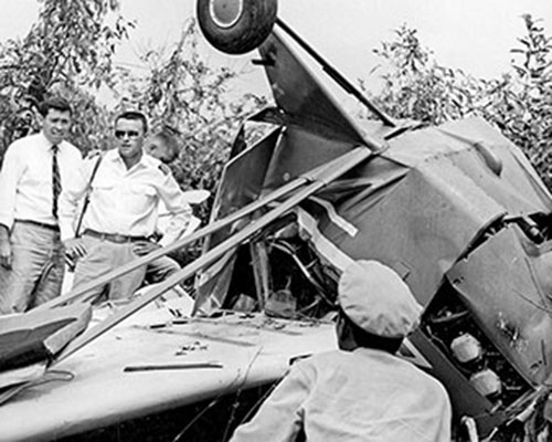 A multinational team investigates the crash site of Frank Corrigan’s Cessna O-1 Bird Dog.