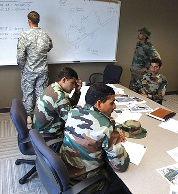 U.S. and Indian personnel conduct pre-mission planning.
