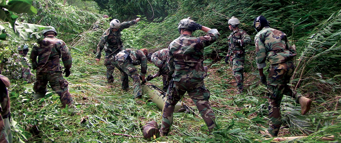 SORT personnel conduct jungle extraction training with Green Berets from the 10th Special Forces Group (Airborne).