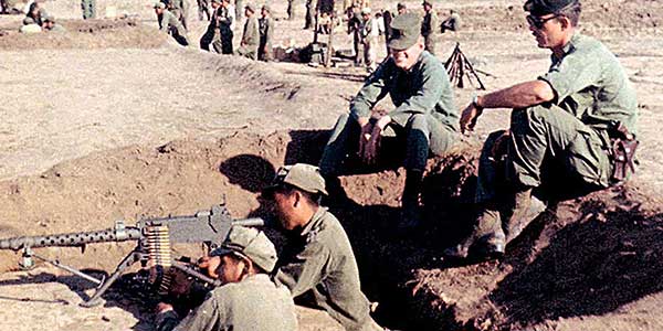 8th SFG Sergeant Alvin E. Graham (right) trains Bolivian infantrymen on the Browning .30 caliber light machinegun. SF efforts in Bolivia helped that nation's military neutralize infamous Communist agitator Ernesto 'Che' Guevara in late 1967.