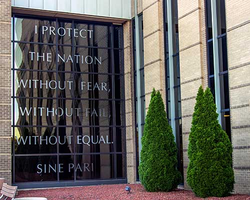 Along with USASOC's creed, its motto adorns the entrance to the headquarters building.