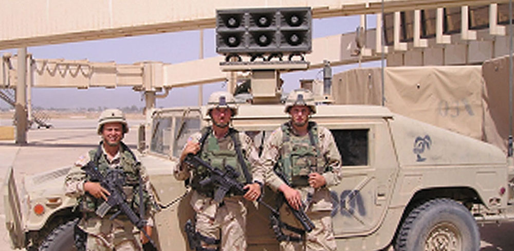 TPT 983 members SPC Buryl Ewing, SGT Joseph Tetreault, and PFC Justin Warden used their loudspeaker vehicle in support of a 2-69th Armor mission to destroy a weapons cache in the Al Kazimiyah area of Baghdad. The simple mission turned complicated when the column was ambushed by insurgents.