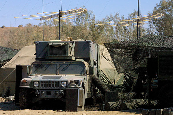 The Special Operations Media System-B (SOMS-B) consists of a Mobile Radio Broadcast System (MRBS) and a Mobile Television Broadcast System (MTBS). With the SOMS-B, the 4th Psychological Operations Group is able to broadcast messages on AM, FM, and short wave radio bands, as well as television signals.