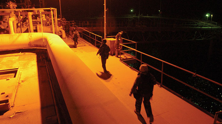 Navy SEALs secured offshore drilling facilities in the predawn hours of 21 March 2003. Positive media coverage of the GOPLATS mission proved the value of the embed program and provided a model for SOF-media cooperation throughout OIF.