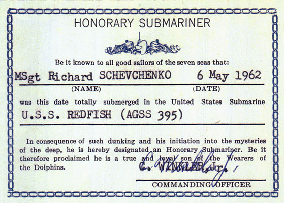 Honorary Submariner card given to MSGT Richard Schevchenko