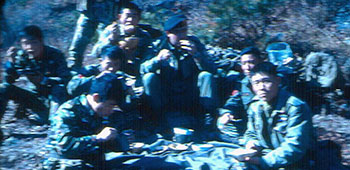 SFC Spencer Gay having lunch in the field with the ROKA Special Forces.