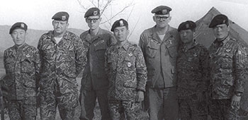 SGM Richard Henrickson, SSG Dewberry, LTC Lim Dong Won (retired LTG), SFC William Taylor, and SGM Chay at the ROKA SF command post during a field exercise circa 1970–73