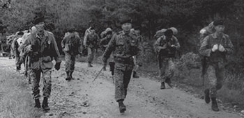 LTC Kim leads his SF battalion on a roadmarch during a FTX.