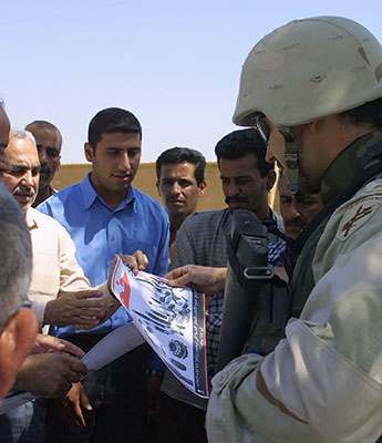The 315th Tactical Psychological Operations Company developed and distributed handbills and posters warning of mines and unexploded ordnance scattered throughout Baghdad. As Tactical Psychological Operations Teams made their distribution rounds, they took the opportunity to interview residents regarding the effectiveness of the products.