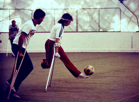 Dolores “Dee” Malchow controls the ball against a Caldwell Banker player on 13 August 1983. Games against ablebodied soccer teams reminded players and observers how exciting and physically demanding the game was. Media coverage brought the sport into a more mainstream environment.