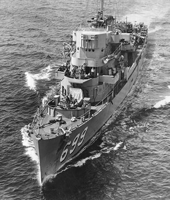 USS Marsh (DE-699), one of the U.S. Navy’s floating power stations, supported the JACK Special Mission Group during October 1952. Its 26-foot plywood whaleboats towed SMG raiders in rubber boats offshore of the selected beach landing site at night.
