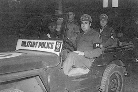 American, British, French, and Soviet Military Police patrol in Vienna.