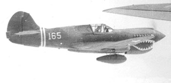 The C-87 drop aircraft for “B” Group was escorted by a flight of P-40 fighters, one of which is seen here. Since “B” Group was dropped far into Japanese territory, notice the drop tank that increased the range of the P-40. Lieutenant Colonel John Allison led the escorts. Colonel Phillip Cochran and Allison later formed the 1st Air Commando Group.