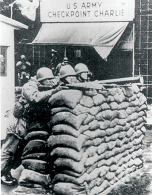 U.S. troops confront Soviet tanks at Checkpoint Charlie on 12–13 August 1961.