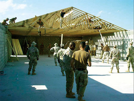 Members of SOD-JF helped build the CJSOTF-W headquarters from scratch prior to the invasion of Iraq. Shown here is the construction of the shell that became the Sensitive Compartmented Information Facility (SCIF).