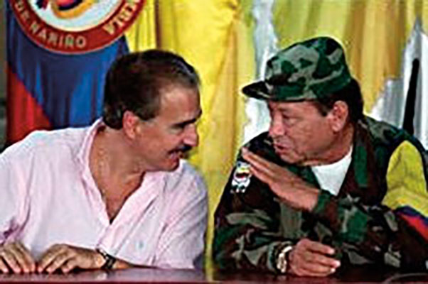 On 7 November 1998, Colombian President Andrés Pastrana Arango granted the FARC a 42,000 square kilometer demilitarized safe area, known derisively as “FARClandia.” Here Pastrana and the FARC founder and leader, Pedro Antonio Marín, engage in unfruitful peace negotiations.