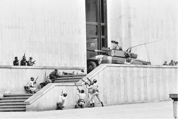On 6 November 1985, the M-19 seized of the Palace of Justice in Bogotá. Here a Colombian Army Cavalry Regiment EE-9 Cascavel armored car breached and entered the building while firing its 90mm main gun.