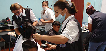 Barbers provide haircuts to the locals in Fusagasugá.