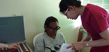 An eye exam being conducted during the MEDRETE in San José. The optometrists and technicians can provide quick basic care.