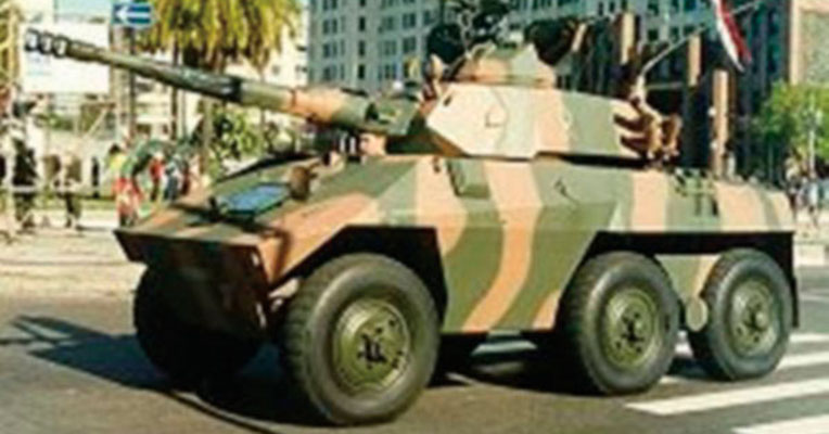 The EE-9 Cascavel armored car was developed by the Brazilian company, Engesa. It features a 90mm main gun, has a crew of three, and is extensively used by the Colombian cavalry elements.
