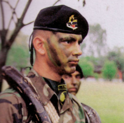 Graduates of the Lancero Course receive the coveted Lancero badge. This soldier with a large boa on his shoulders, typifies the image of the Lanceros.