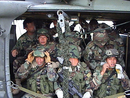 The BACOA use the fast-rope technique of insertion during missions. Here BACOA troops train at Tolemaida with their Special Forces advisors.