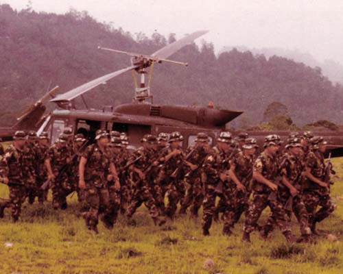 Salvadoran Army troops engaged in an air mobile operation.  The training of the ESAF by the American OPATTs enhanced the capability of the Salvadoran Army and resulted in the eventual defeat of the FMLN.