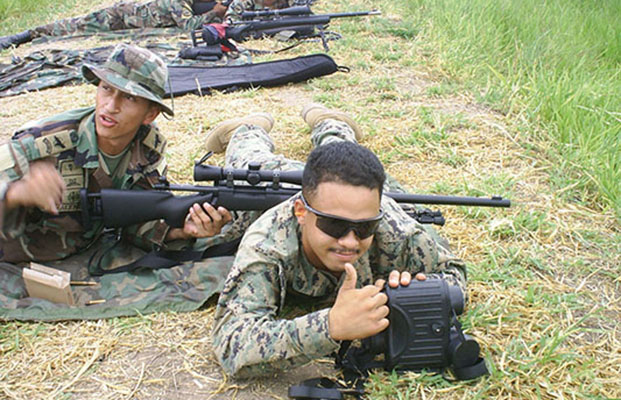 A member of FMTU-5 indicates that the Colombian Special Forces sniper is doing well.