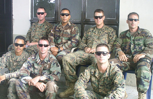 Members of ODA 753 Team 3 with FMTU-5 Marines in Larandia.