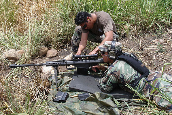 ODA 746 soldiers fire the .50 caliber M82 Barrett sniper rifle.