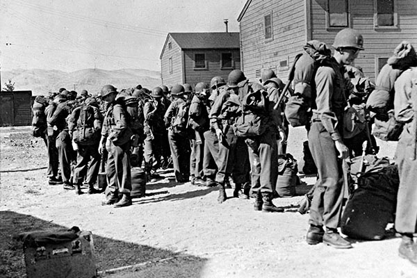 Troops preparing to depart Camp Stoneman, California.