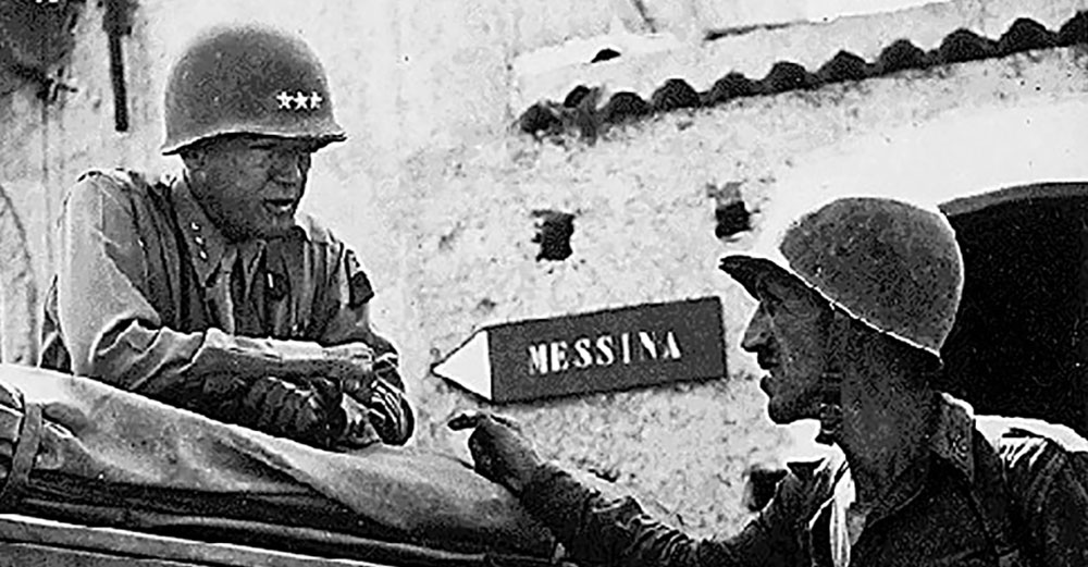 Lieutenant General George S. Patton confers with Lieutenant Colonel Lyle A. Bernard on the drive to Messina. LTC Bernard’s 2nd Battalion, 30th Infantry, was inserted behind the German lines at Brolo Beach.