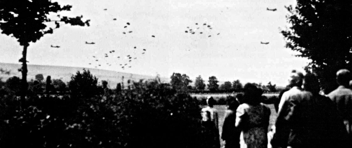 French civilians observe USAAF B-17s dropping supplies on 14 July 1944 (Bastille Day) during Operation CADILLAC.