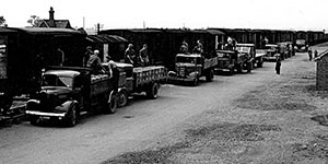 Personnel at Area H unload supplies from the local rail station. These supplies would then be packed and dropped into occupied Europe.