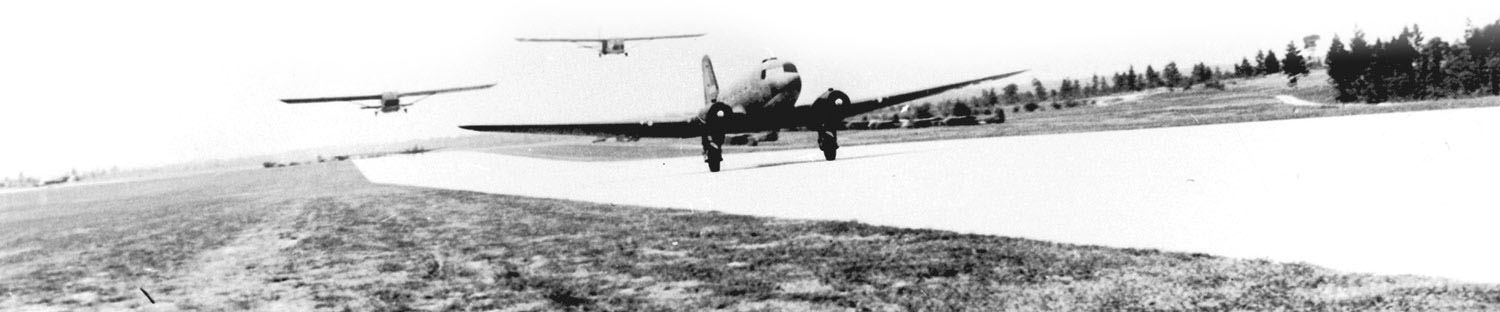 In the glider jump tests, a C-47 aircraft would tow two paratrooper-laden CG-4A Waco gliders.