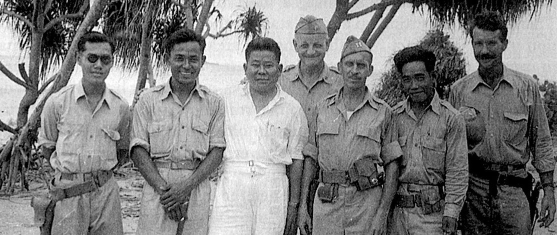Free Thai members of the OSS DURIAN operation pose in Trincomalee, Ceylon, with their trainers and advisors.