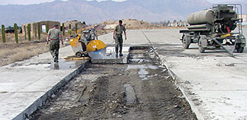 Extensive excavation was required before new runway slabs could be poured. The landing of heavy cargo aircraft necessitated a major runway repair effort at Bagram.