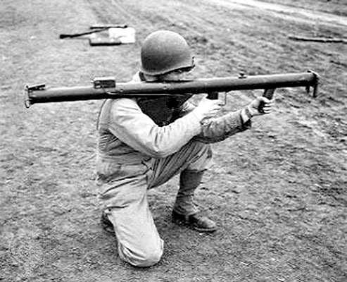 A soldier firing the M1A1 “Bazooka”. “The rockets simply bounced off the sides of the German tank vehicle or exploded to no effect unless it hit an opening or perhaps just the right angle of a track to disable it” recalled SGT Douglas Dillard of the 551st PIB (Parachute Infantry Battalion).