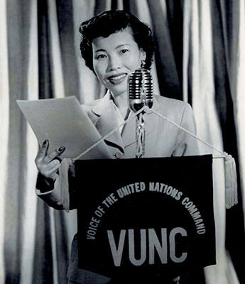 Bik Cha Kim, a Korean actress-announcer makes a radio broadcast from VUNC in Tokyo. Women were often used for radio broadcasts aimed at the North Korean soldiers and civilians.