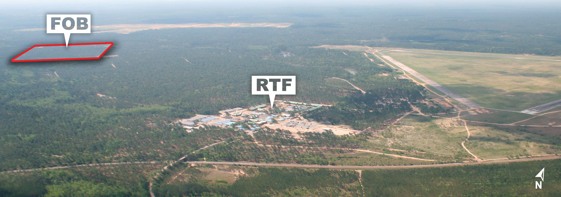 Aerial view of Camp Mackall taken in May 2007. In the center of the photo is the Rowe Training Facility (RTF). The FOB Freedom area is outlined in red.