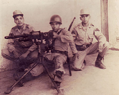 SGT (then CPL) Luís Mariano Turcios poses with his machinegun crew in El Salvador. This is a French produced Hotchkiss M1914 8mm machinegun. LTC Turcios led the ESAF Airborne Battalion for five years and then as a colonel, commanded the 6th Brigade, during the war.