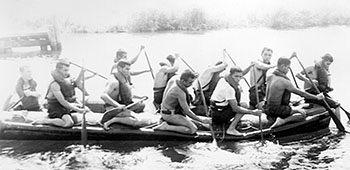 Salvadoran Ranger students paddle the RB-15 on Gatun Lake.