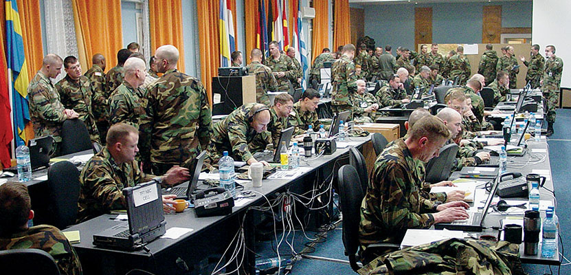 Support to today’s Army Special Operations Forces requires a complex communications network for voice and  data transmission world-wide. The Operations Center of the 10th Special Forces Group during the opening stages  of Operation IRAQI FREEDOM shows the extensive C4I network supporting operations.