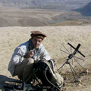 In the high mountain terrain of Afghanistan, satellite communications was critical for the far-flung Special Forces teams in Operation ENDURING FREEDOM in 2001. A member of the 5th Special Forces group has set-up a AN-PRC 104 capable of transmitting voice  and data around the globe.