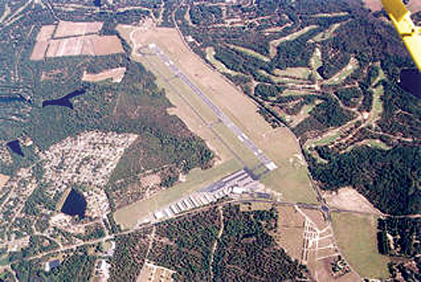 Knollwood Army Auxiliary Airfield now Moore County Regional Airport as it appears today. The visible open areas became drop and landing zones for parachute and glider forces during the airborne assault on Knollwood on 7 December 1943.