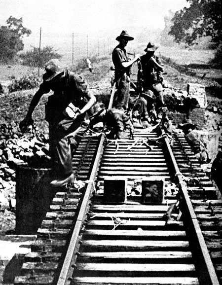 Chindits lay explosives on a rail line in Japanese-occupied Burma.