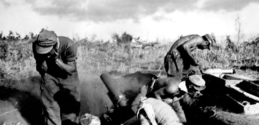 A MARS Task Force crew uses its 4.2” mortar to shell Japanese positions along the Burma Road, January-February 1944.