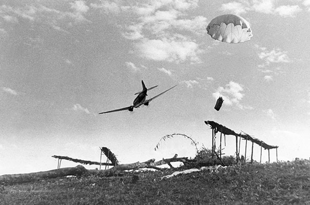 Allied units in the north Burma offensive relied upon aerial resupply, such as this drop in early 1944. The bulky packages have been wrapped in burlap to help protect them from the shock of landing. Aerial resupply prevented the Marauder’s 2nd Battalion from being overrun at Nhpum Ga.