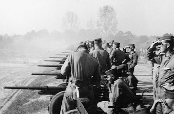Officer Candidates at Fort Benning, GA, practice anti-tank gunnery in February 1942.