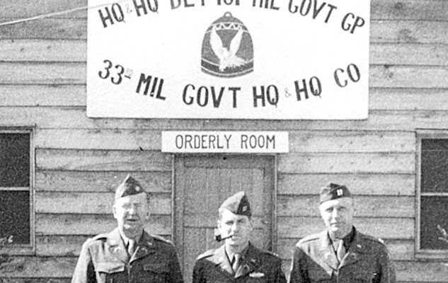 101st and 33rd Military Government Group orderly rooms. CPT Vangen is on the right.